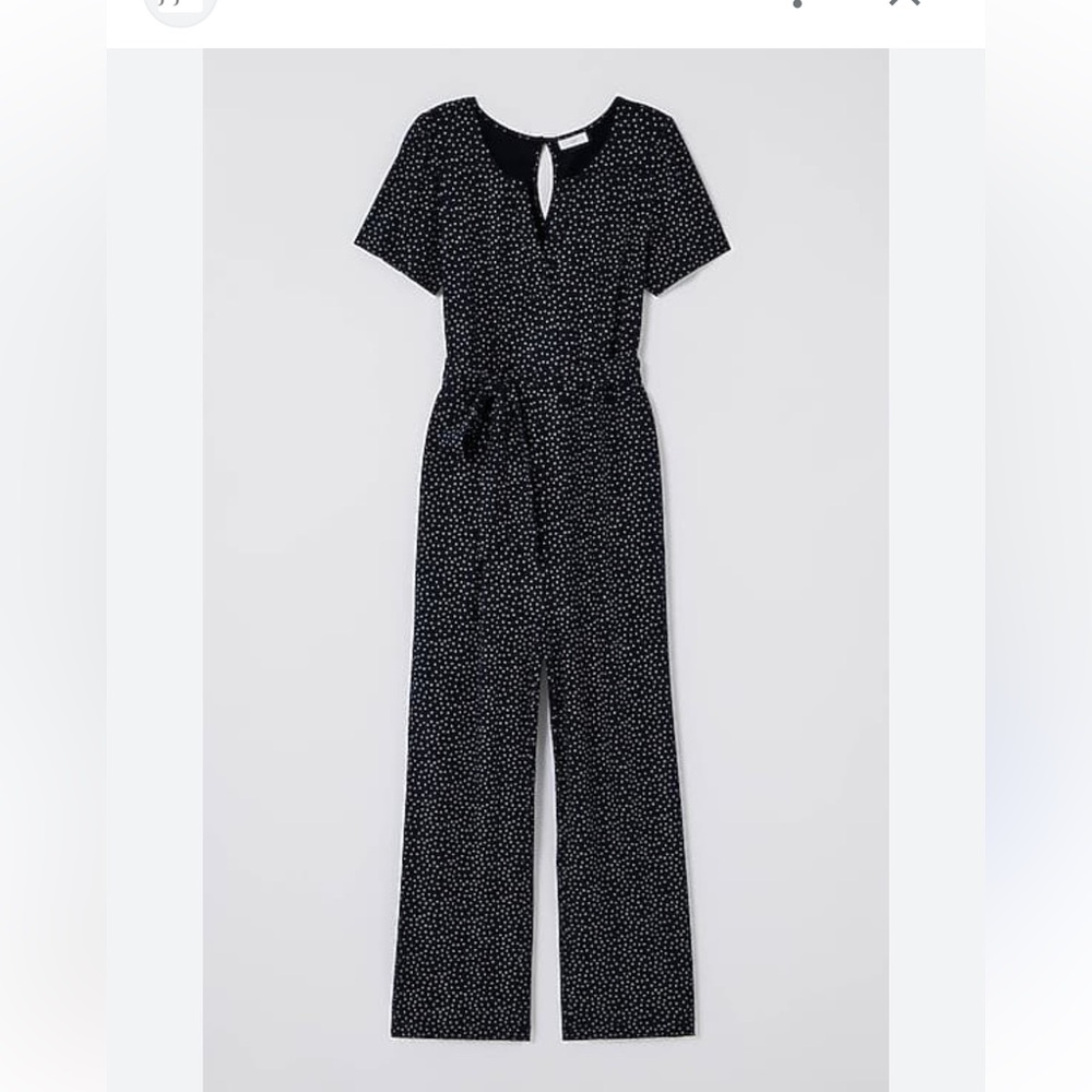 Navy short sleeve jumpsuit with white polka dots